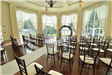 Indoor wedding set up in front of large window