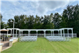 Outdoor wedding set up with a pergola