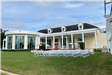 Outdoor wedding setting in front of building
