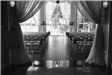 Black and white photo of indoor wedding set up