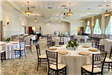 Indoor reception setting with round tables