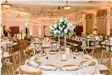 Tall floral arrangement on round table