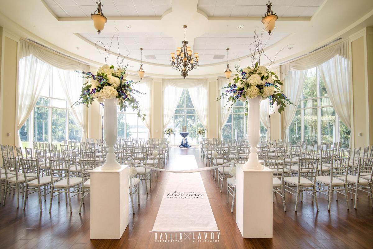 Indoor wedding setting with aisle runner