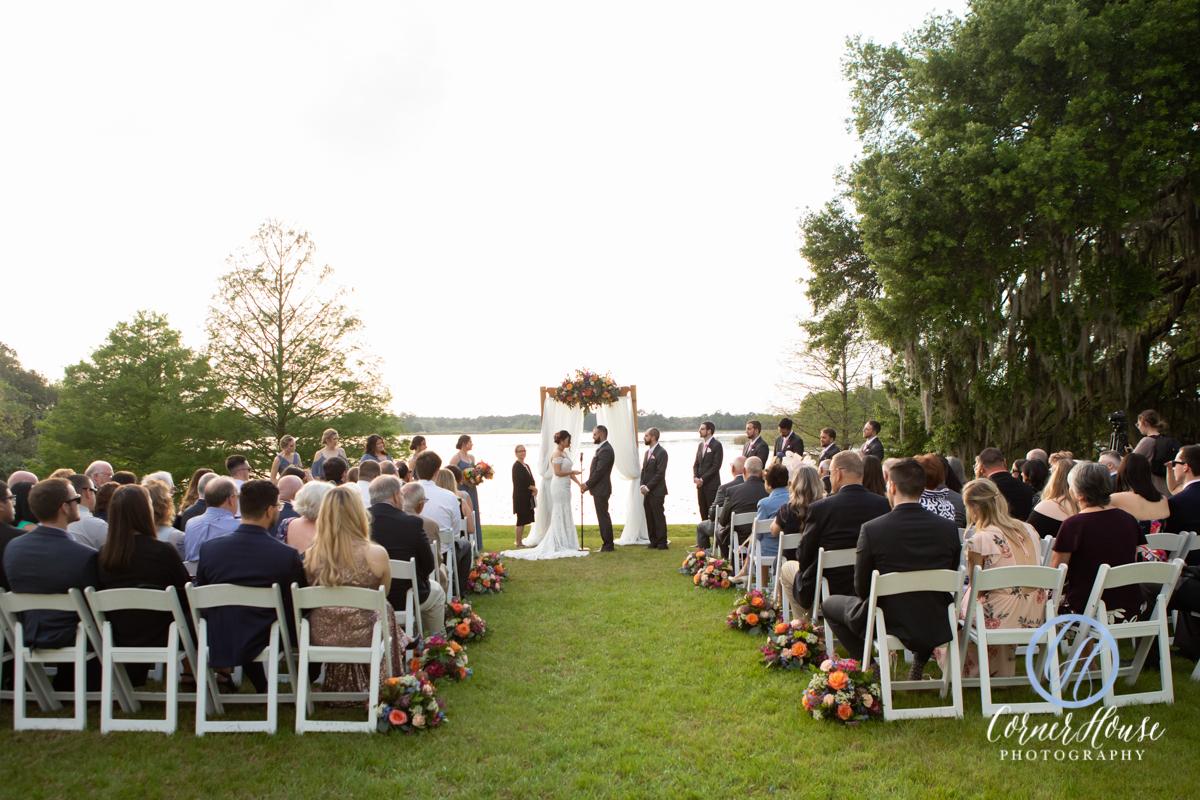 Outdoor wedding ceremony in front of the lake