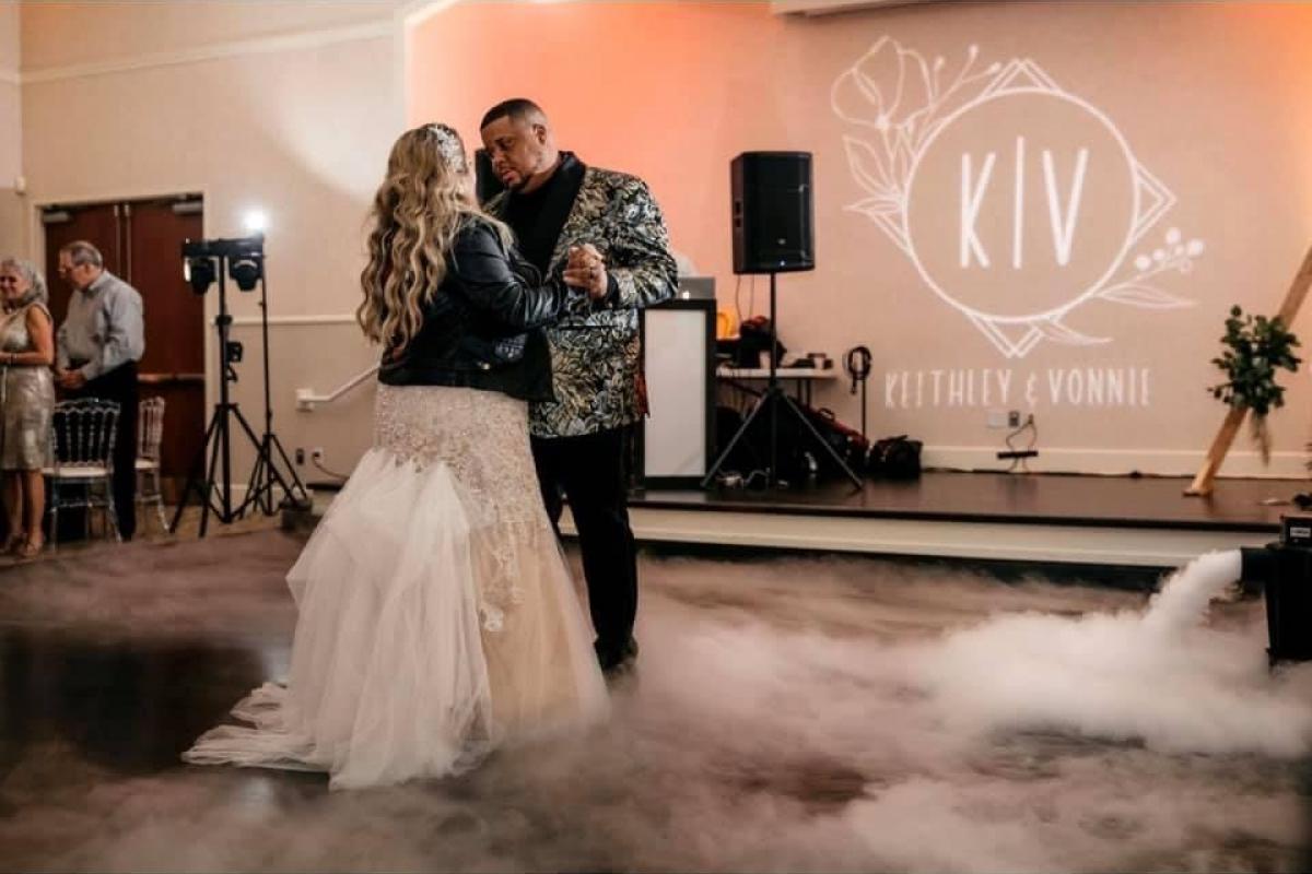 Bride and groom dancing