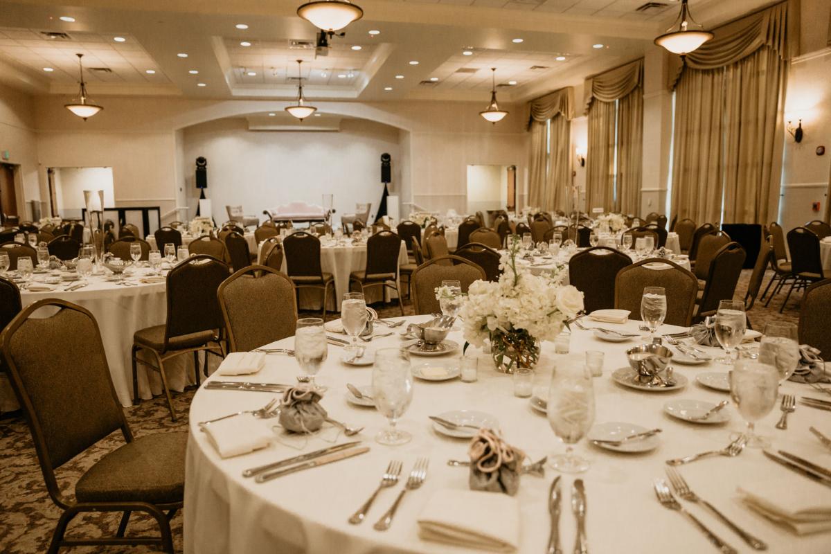 Indoor reception setting with round tables